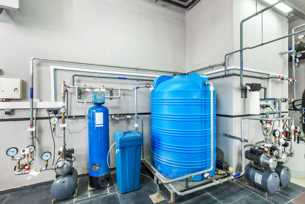 ndustrial gas boiler water treatment system with storage tanks and multiple filters.